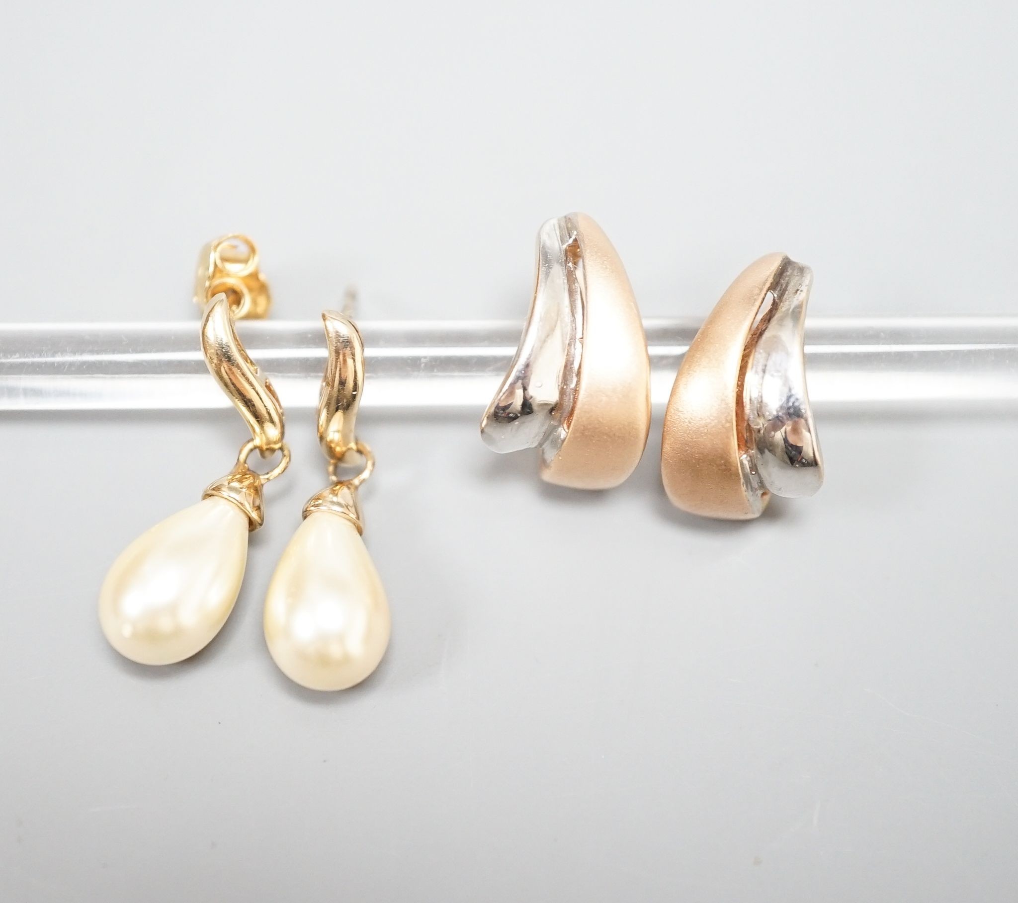 A modern pair of two colour 14k earrings, 4.1 grams and a pair of simulated pearl set earrings.